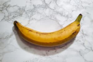 unpeeled-yellow-plantain-medium-ripeness