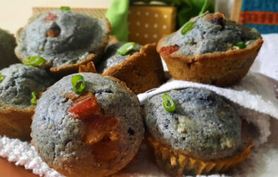 bacon-blue-corn-muffins-with-Hatch-chiles-side-view-garnished-with-green-onions