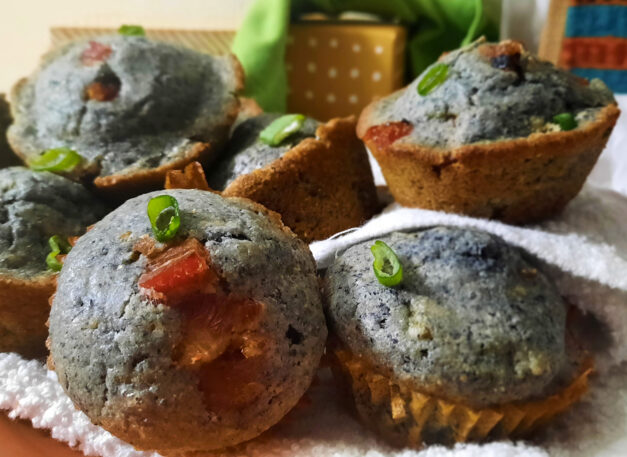 bacon-blue-corn-muffins-with-Hatch-chiles-side-view-garnished-with-green-onions