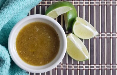 white-bowl-Cuban-mojo-sauce-garnished-with-limes