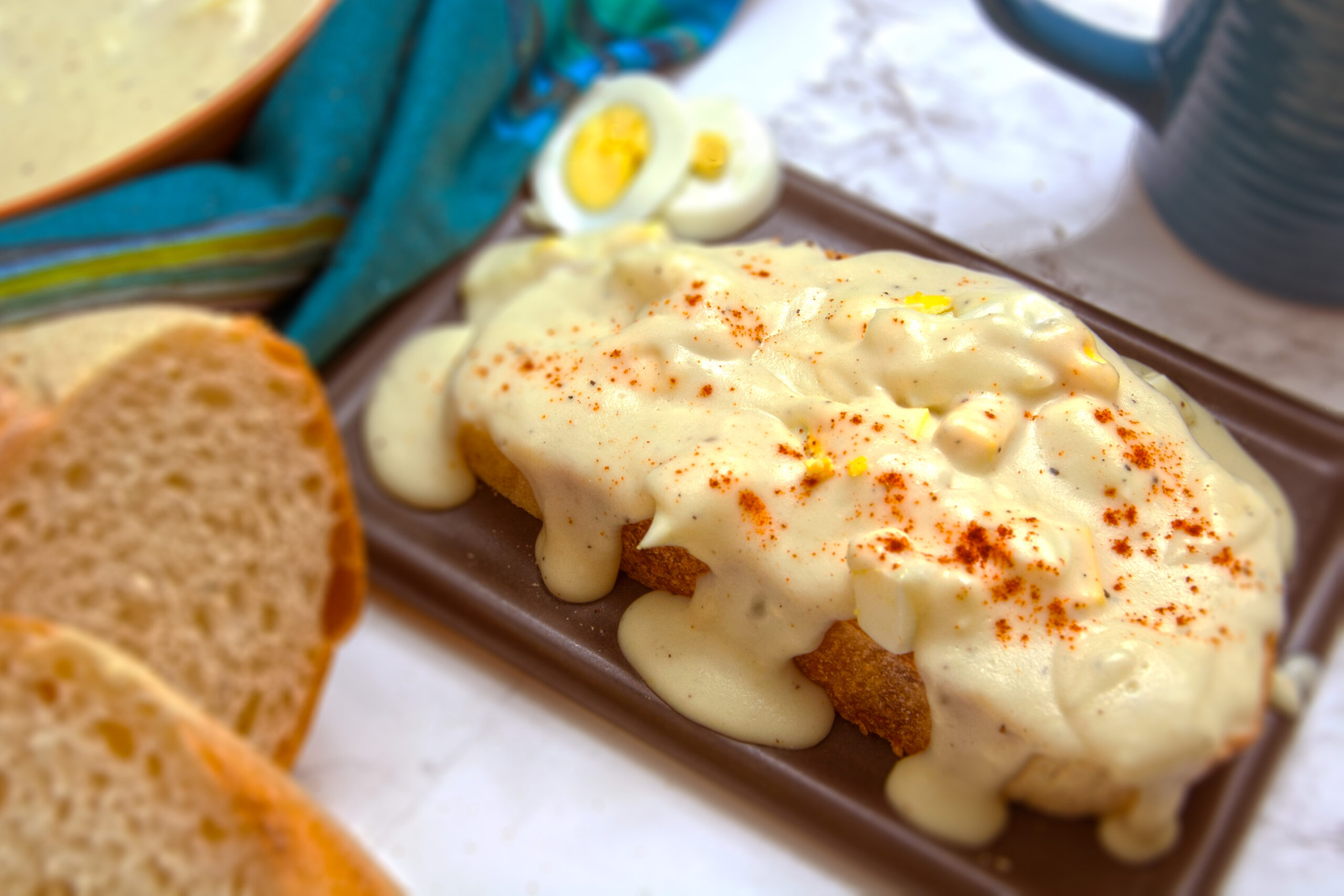 creamed-eggs-on-toast-garnished-with-paprika