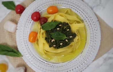 egg-noodles-topped-with-kaffir-basil-pesto-garnished-with-leftover-kaffir-lime-leaves-and-tomatoes