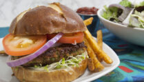 black-eyed-pea-unique-veggie-burger-recipe-served-on-bun-on-white-plate-with-fries