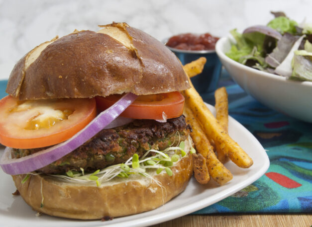 black-eyed-pea-unique-veggie-burger-recipe-served-on-bun-on-white-plate-with-fries