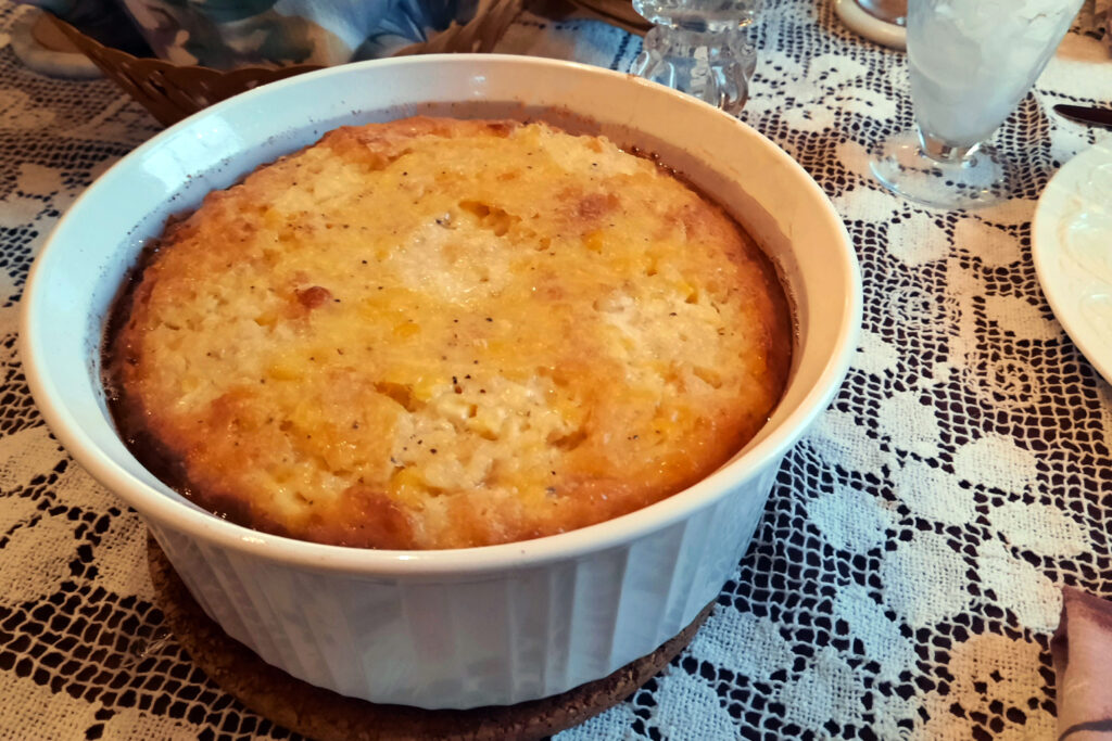 whole-Swedish-corn-pudding-after-baking-in-white-ceramic-dish