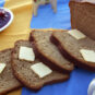 cascading-sliced-Swedish-rye-bread-and-butter-served-with-lingonberries