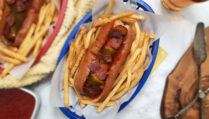 top-view-Colorado-Christmas-dog-wrapped-in-Hatch-chile-served-in-basket-of-fries