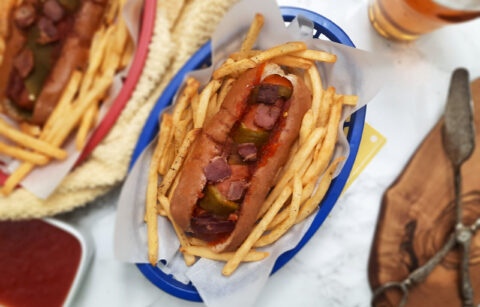 top-view-Colorado-Christmas-dog-wrapped-in-Hatch-chile-served-in-basket-of-fries