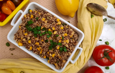 top-view-Honey-butter-quinoa-and-corn-BBQ-side-dish-garnished-with-tomatoes