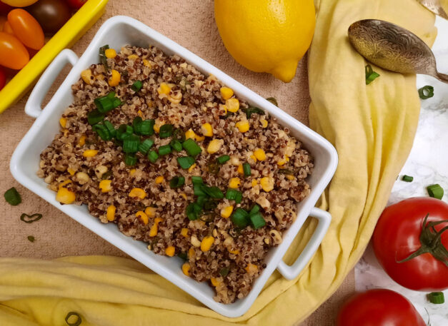 top-view-Honey-butter-quinoa-and-corn-BBQ-side-dish-garnished-with-tomatoes