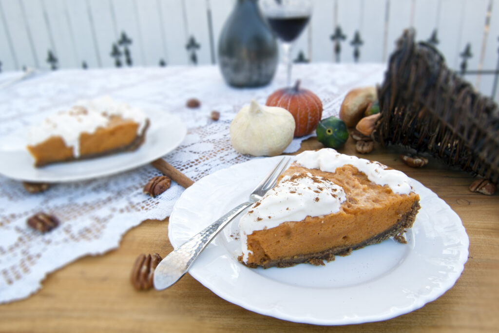 pumpkin-chiffon-pie-slice-garnished-with-whipped-cream-and-cinnamon