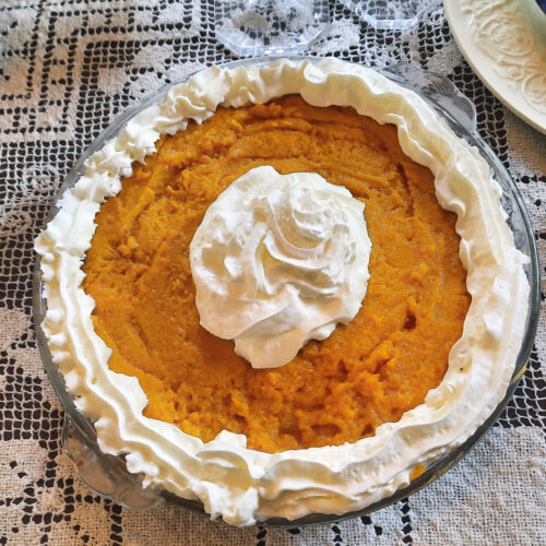 light-and-fluffy-whole-pumpkin-chiffon-pie-topped-with-whipped-cream