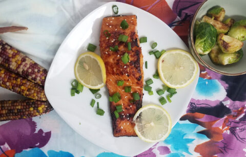 seared-and-baked-portion-hoisin-maple-salmon-served-with-brussels-corn-lemons-and-chives