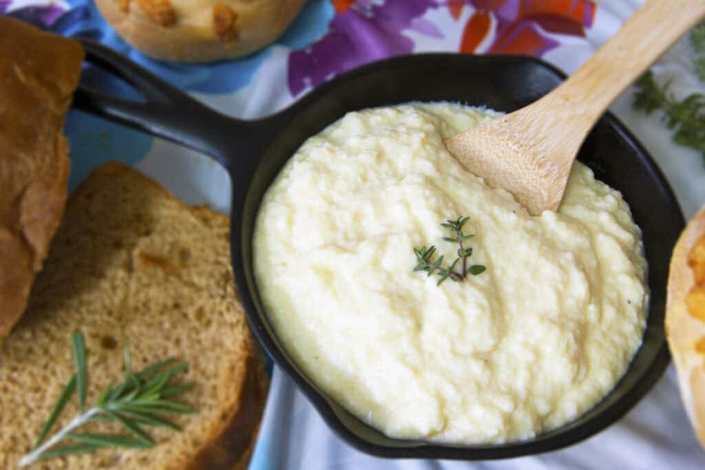 cast-iron-skillet-with-swedish-egg-gravy-and-wooden-spoon