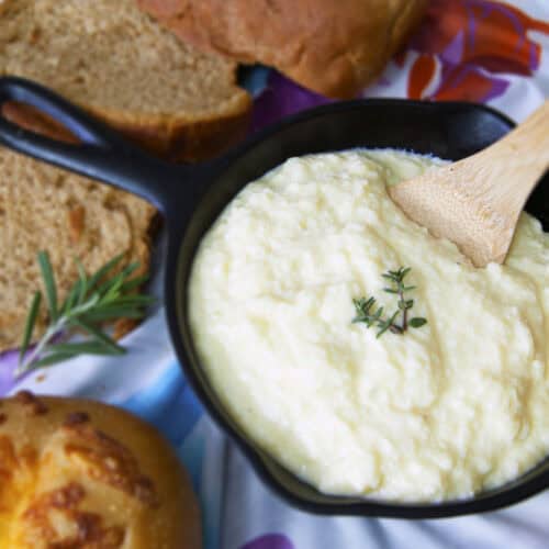 cast-iron-skillet-with-Swedish-egg-gravy-and-wooden-spoon